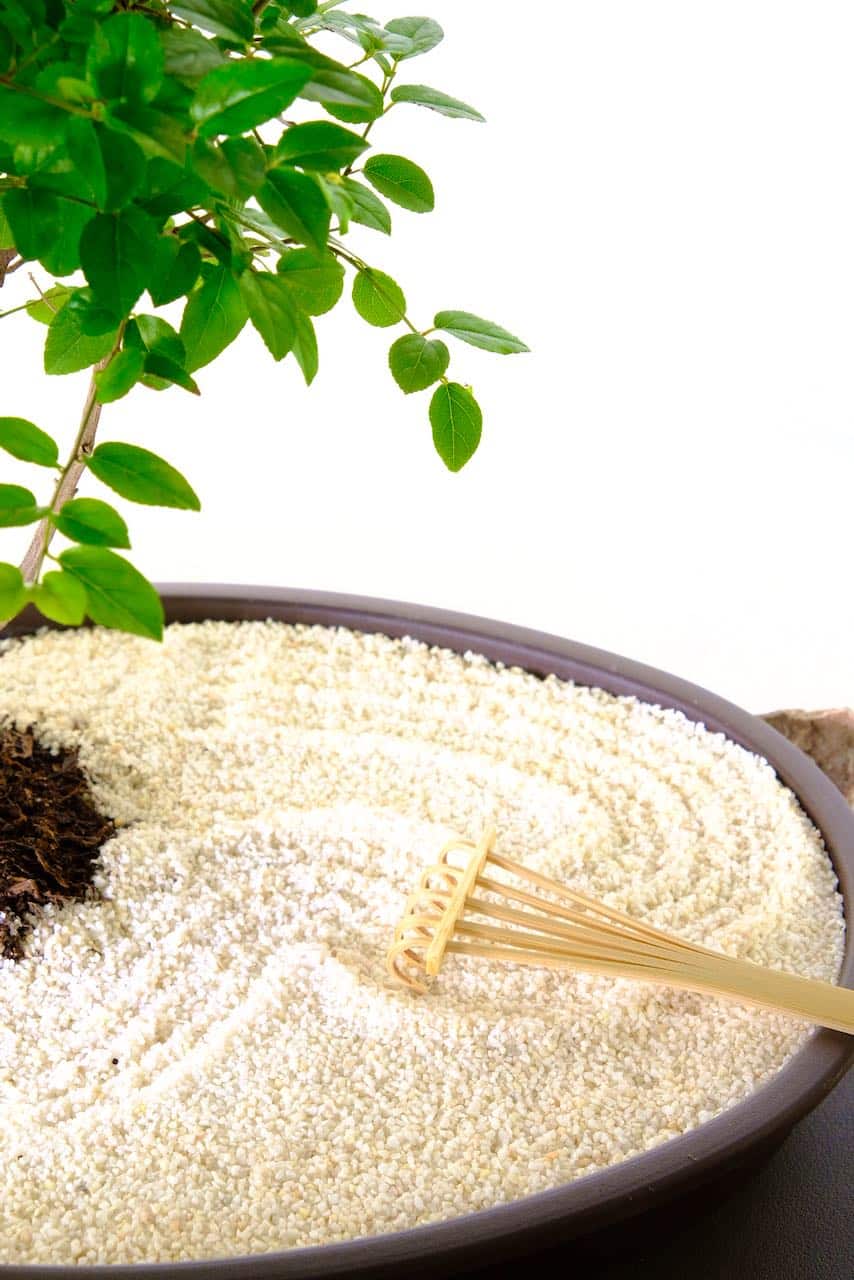 Enjoy positioning rocks and racking to create a beautiful garden