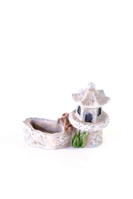 Miniature lantern in shape of pagoda with pool